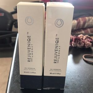 Monet Rejuveniqe Oil treatment. 2 new 1fl oz bottles in box .